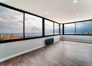 شقة بإطلالة رائعة على البحر في منطقة تشاغلايان الصغيرة - أنطاليا