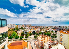 شقة بإطلالة رائعة على البحر في منطقة تشاغلايان الصغيرة - أنطاليا