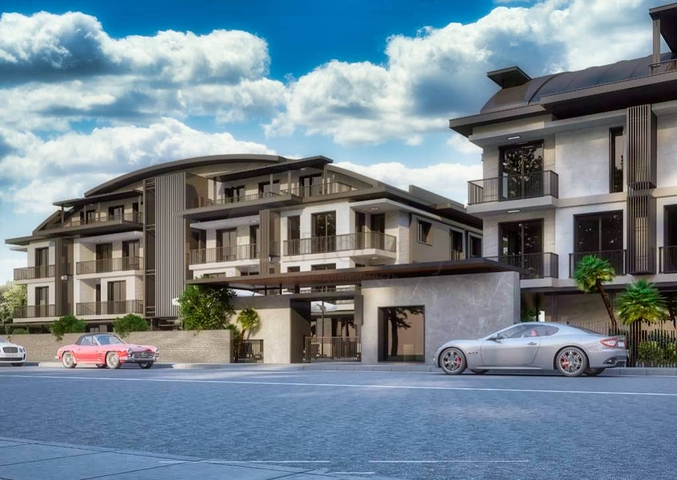 شقق 1 + 1 ، 2 + 1.3 + 1.4 + 1 في مجمع مريح في منطقة لارا - أنطاليا