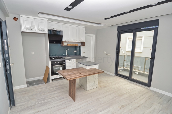 شقة 1 + 1 في مبنى جديد بوسط المدينة