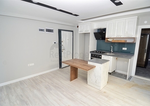 شقة 1 + 1 في مبنى جديد بوسط المدينة