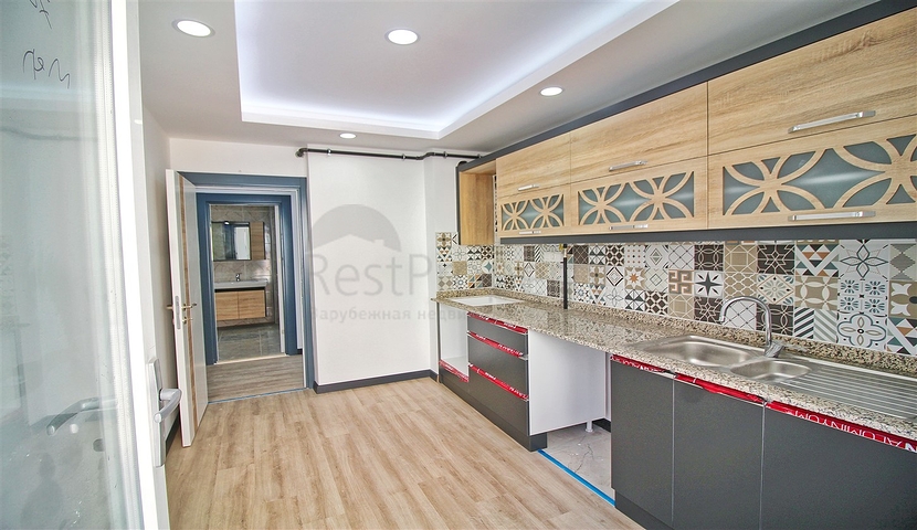 شقة بتصميم 2 + 1 في وسط أنطاليا