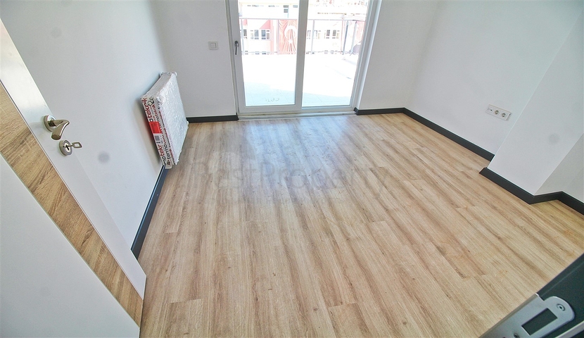 شقة بتصميم 2 + 1 في وسط أنطاليا