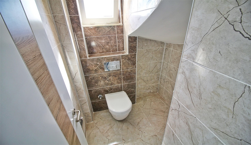 شقة بتصميم 2 + 1 في وسط أنطاليا