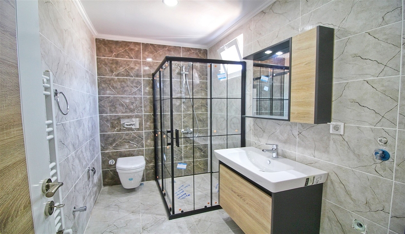 شقة بتصميم 2 + 1 في وسط أنطاليا