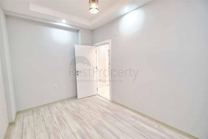 شقة بتصميم 2 + 1 في وسط أنطاليا