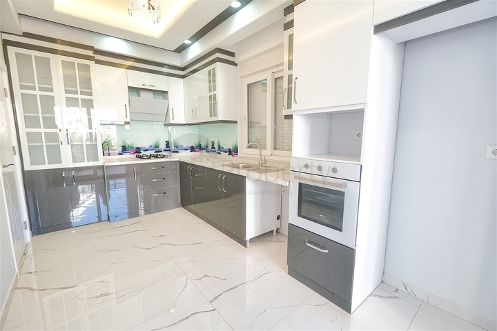 شقة بتصميم 2 + 1 في وسط أنطاليا