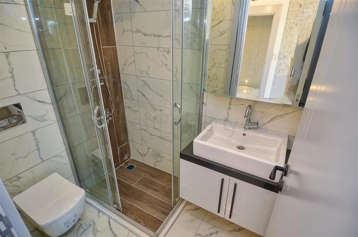 الشقق 1 + 1 ، 2 + 1 ، 3 + 1 في منطقة كيبيز - أنطاليا