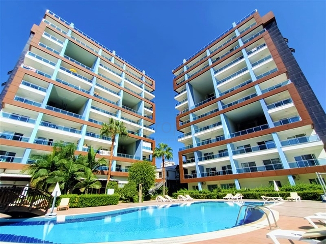 خلف مول الانيوم - شقة غرفة وصالة مفروشة -مجمع فاخر - في جيكجلي / الانيا 