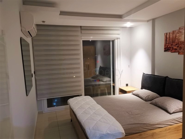 خلف مول الانيوم - شقة غرفة وصالة مفروشة -مجمع فاخر - في جيكجلي / الانيا 