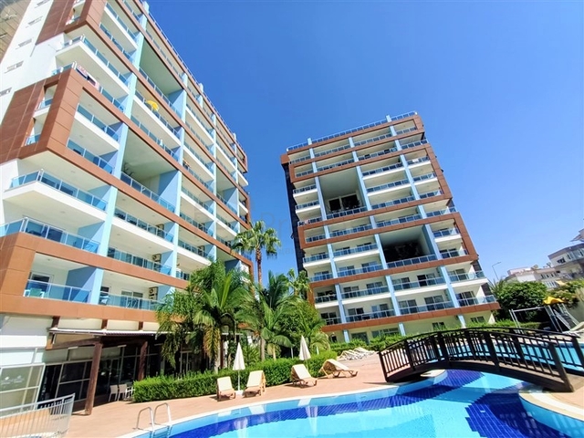 خلف مول الانيوم - شقة غرفة وصالة مفروشة -مجمع فاخر - في جيكجلي / الانيا 