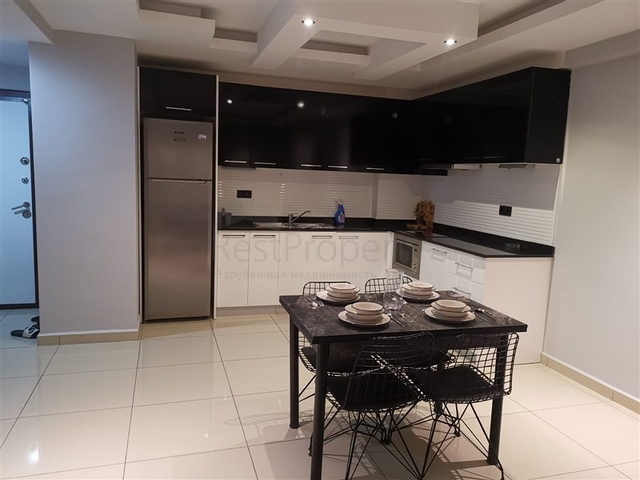 خلف مول الانيوم - شقة غرفة وصالة مفروشة -مجمع فاخر - في جيكجلي / الانيا 