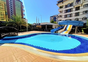 خلف مول الانيوم - شقة غرفة وصالة مفروشة -مجمع فاخر - في جيكجلي / الانيا 