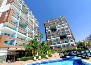 خلف مول الانيوم - شقة غرفة وصالة مفروشة -مجمع فاخر - في جيكجلي / الانيا 