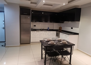 خلف مول الانيوم - شقة غرفة وصالة مفروشة -مجمع فاخر - في جيكجلي / الانيا 