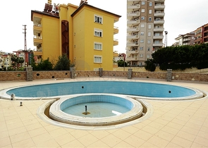 شقة بنتهاوس ضمن أحد المجمعات السكنية في منطقة جيكجيلي – ألانيا