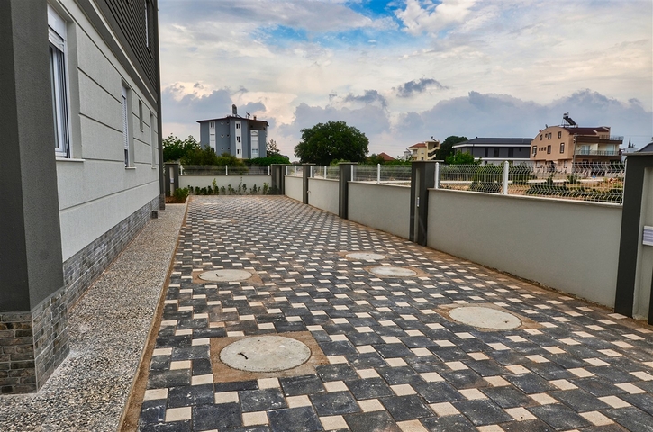 مبنى مكون من 4 شقق في منطقة دوشيمالتي-أنطاليا 
