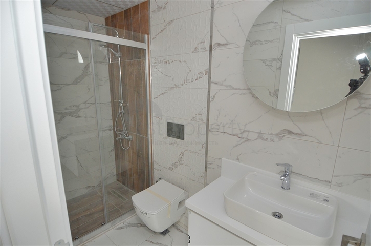 مبنى مكون من 4 شقق في منطقة دوشيمالتي-أنطاليا 