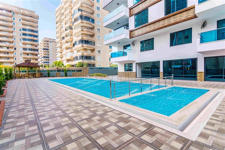 دوبلكس فاخرة ضمن مجمع حديث - قريبة من البحر / مهموتلار / الانيا 