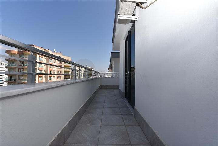 دوبلكس فاخرة ضمن مجمع حديث - قريبة من البحر / مهموتلار / الانيا 