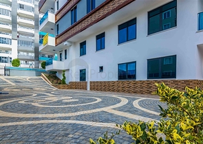 دوبلكس فاخرة ضمن مجمع حديث - قريبة من البحر / مهموتلار / الانيا 