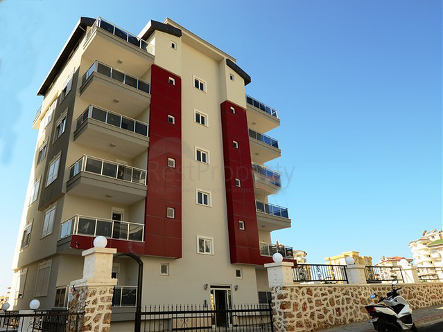 شقة مكونة من اربع غرف نوم ضمن مجمع عصري