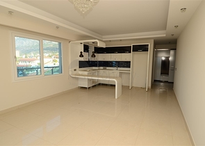 شقة بإطلالات جبلية ساحرة في منطقة محمود لار – ألانيا