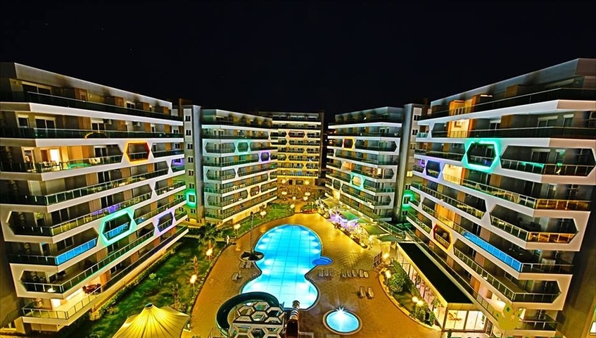 شقة غرفة وصالة ضمن مجمع سكني يضم كافة الخدمات في افسلار / الانيا 