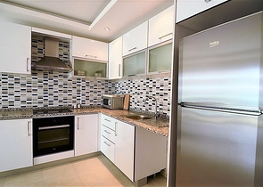 شقة غرفة وصالة ضمن مجمع سكني يضم كافة الخدمات في افسلار / الانيا 