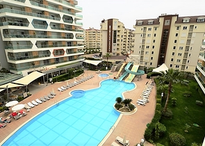 شقة غرفة وصالة ضمن مجمع سكني يضم كافة الخدمات في افسلار / الانيا 