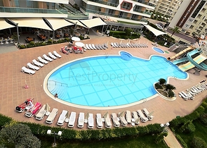 شقة غرفة وصالة ضمن مجمع سكني يضم كافة الخدمات في افسلار / الانيا 