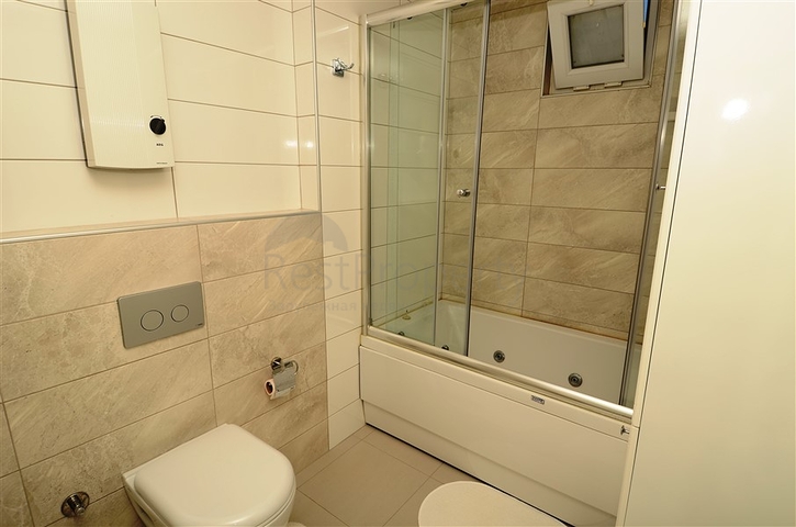 شقة فاخرة من تصميم غرفتين وصالة في الانيا 