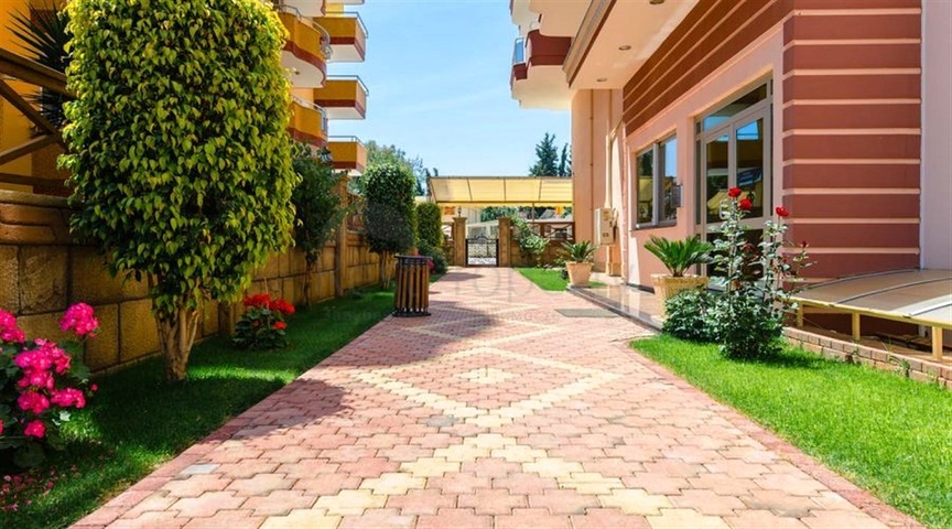 شقة مفروشة ضمن أحد المجمعات بإطلالة ساحرة على البحر الأبيض المتوسط في منطقة محمود لار – ألانيا