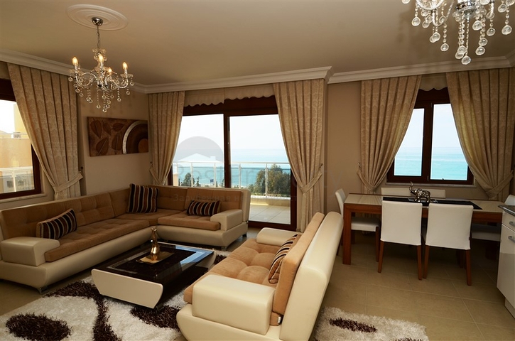 شقة مفروشة ضمن أحد المجمعات بإطلالة ساحرة على البحر الأبيض المتوسط في منطقة محمود لار – ألانيا