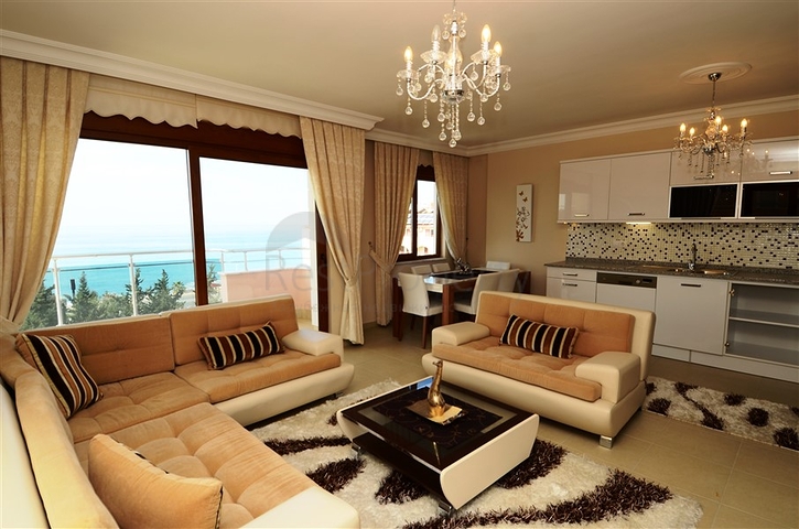 شقة مفروشة ضمن أحد المجمعات بإطلالة ساحرة على البحر الأبيض المتوسط في منطقة محمود لار – ألانيا