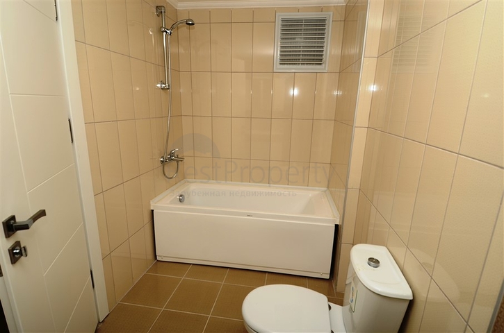 شقة مفروشة ضمن أحد المجمعات بإطلالة ساحرة على البحر الأبيض المتوسط في منطقة محمود لار – ألانيا