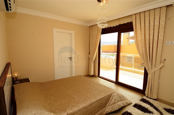 شقة مفروشة ضمن أحد المجمعات بإطلالة ساحرة على البحر الأبيض المتوسط في منطقة محمود لار – ألانيا