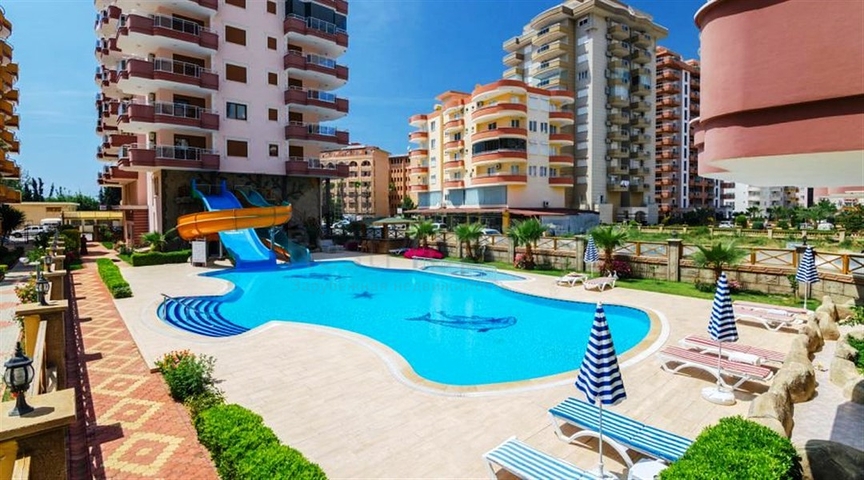 شقة مفروشة ضمن أحد المجمعات بإطلالة ساحرة على البحر الأبيض المتوسط في منطقة محمود لار – ألانيا