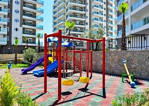 شقة بتخطيط 1+1 ضمن أحد المجمعات الفاخرة بإطلالة بحرية رائعة في منطقة أفسلار – ألانيا