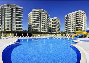 شقة بتخطيط 1+1 ضمن أحد المجمعات الفاخرة بإطلالة بحرية رائعة في منطقة أفسلار – ألانيا