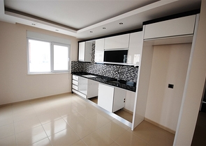 شقة بتخطيط 1+1 في منطقة محمود لار – ألانيا