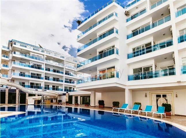 شقة بتخطيط 2+1 مع حديقة ضمن أحد المجمعات الرائعة في منطقة أفسلار – ألانيا