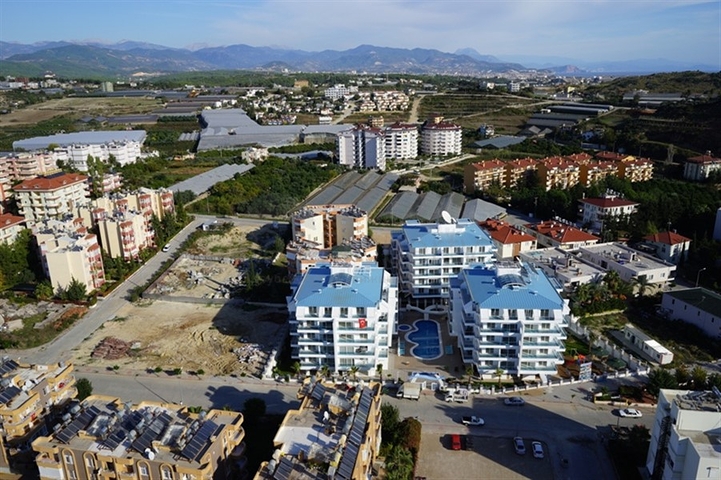 شقة بتخطيط 2+1 مع حديقة ضمن أحد المجمعات الرائعة في منطقة أفسلار – ألانيا