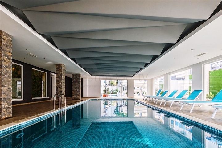 شقة بتخطيط 2+1 مع حديقة ضمن أحد المجمعات الرائعة في منطقة أفسلار – ألانيا