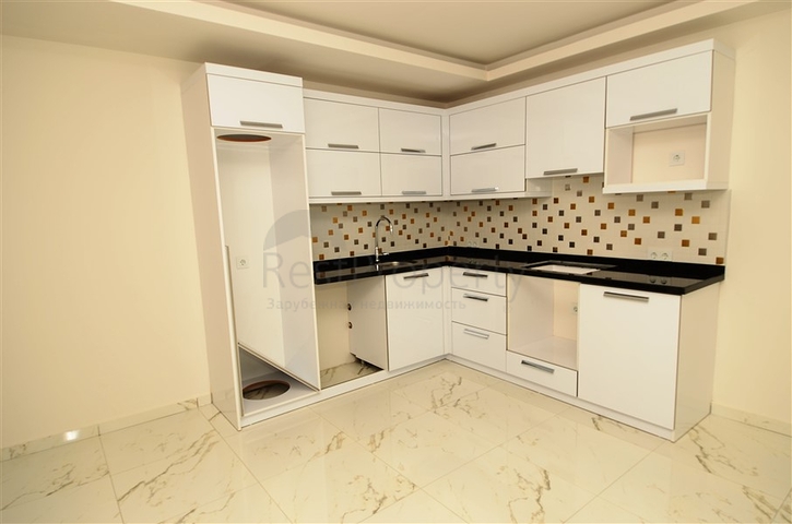 شقة بتخطيط 2+1 مع حديقة ضمن أحد المجمعات الرائعة في منطقة أفسلار – ألانيا