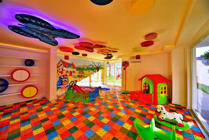 شقة بتخطيط 2+1 مع حديقة ضمن أحد المجمعات الرائعة في منطقة أفسلار – ألانيا