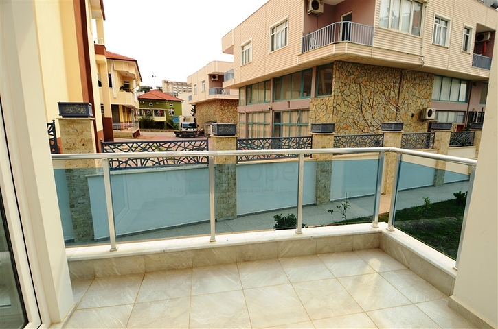 شقة بتخطيط 2+1 مع حديقة ضمن أحد المجمعات الرائعة في منطقة أفسلار – ألانيا