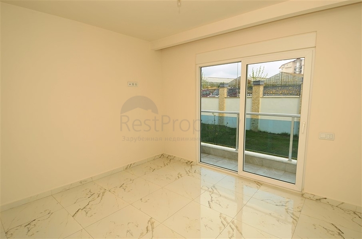 شقة بتخطيط 2+1 مع حديقة ضمن أحد المجمعات الرائعة في منطقة أفسلار – ألانيا