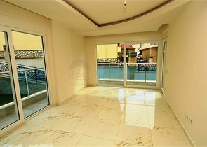 شقة بتخطيط 2+1 مع حديقة ضمن أحد المجمعات الرائعة في منطقة أفسلار – ألانيا