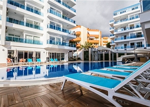 شقة بتخطيط 2+1 مع حديقة ضمن أحد المجمعات الرائعة في منطقة أفسلار – ألانيا